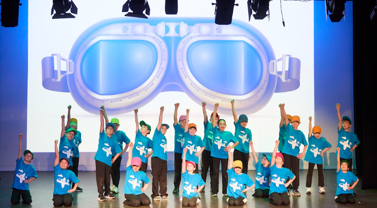 Year 3 students, wearing blue t-shirts and black pants in the