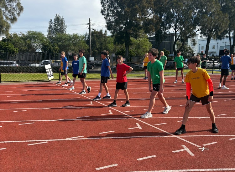 Students lined up on the running track at the athletics carnival.